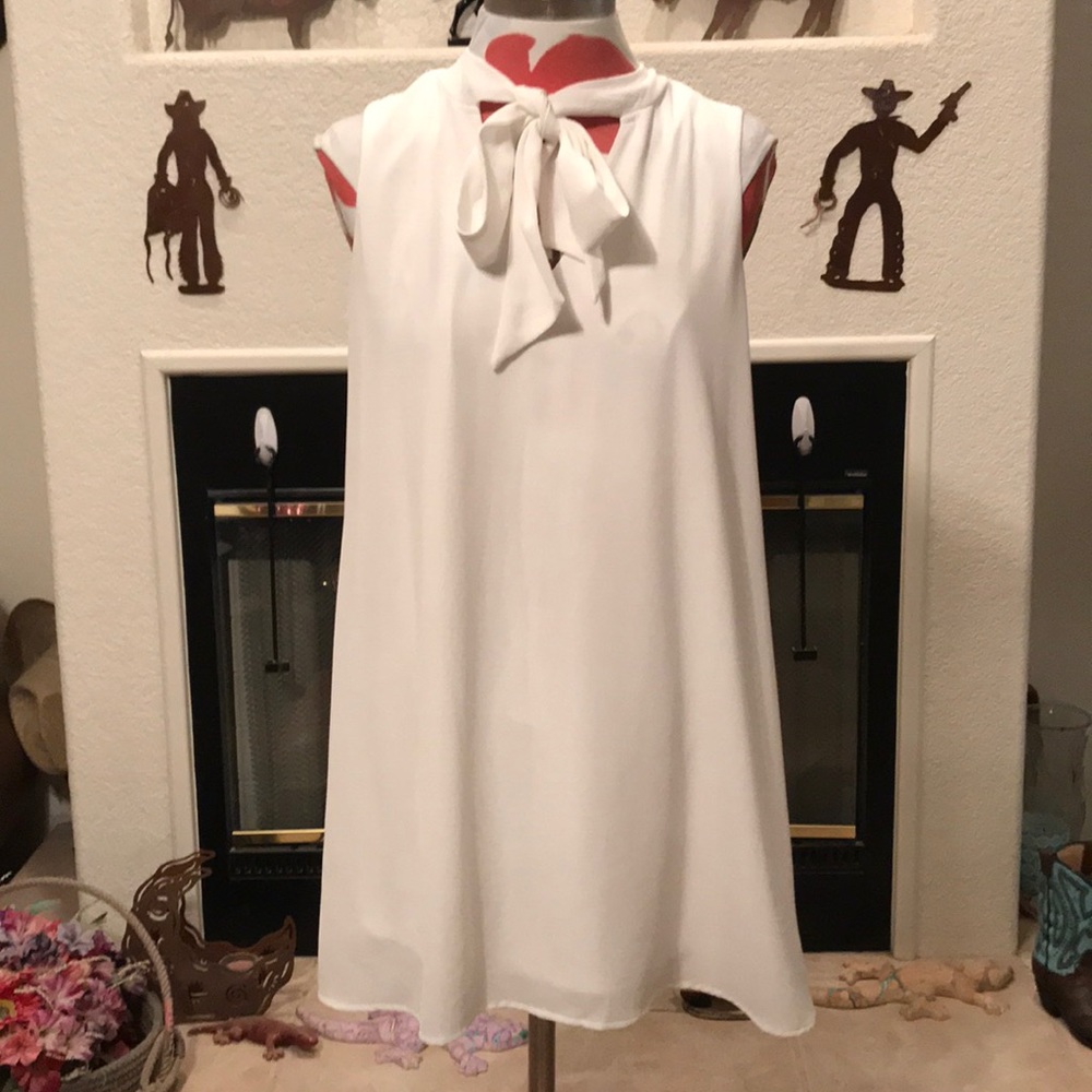 Sleeveless white dress